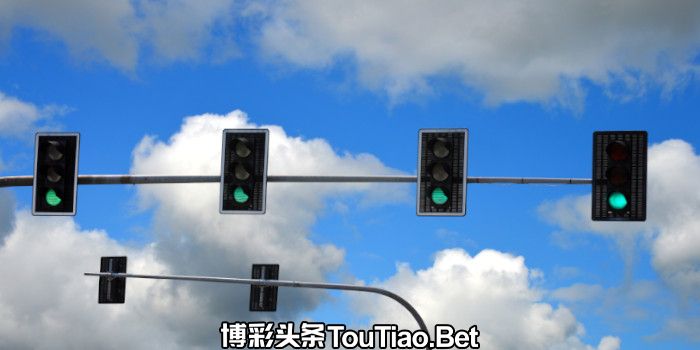Four green traffic lights